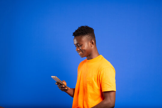 Young man receiving mobile money