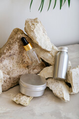 Set natural unisex beauty cosmetic skincare products for man in aluminum jars bottle on stone...