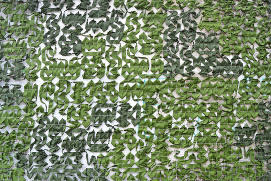 Military camouflage net, hunter net background.