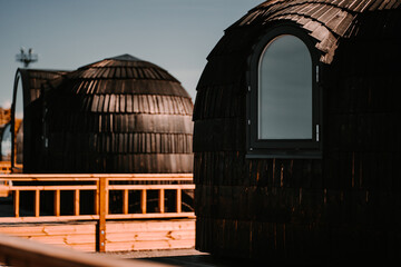 Igloo Village in the very center of the city on the shores of the Baltic Sea in the port of Noblessner in black