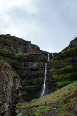 waterfall in the mountains in Iceland