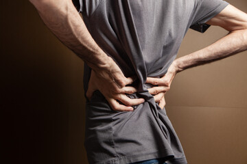 the man's back hurts