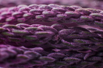 purple threads close up under the microscope background