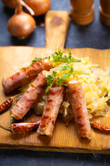 Grilled german sausage links with sauerkraut
