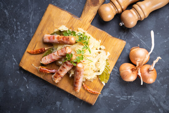 Grilled german sausage links with sauerkraut