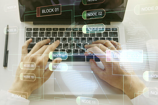 Abstract creative coding concept with world map and hands typing on laptop on background. Multiexposure