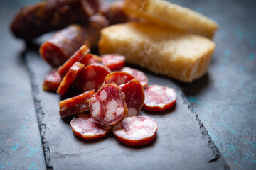Slices of cured meat sausage
