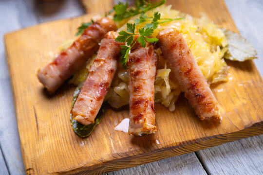 Grilled german sausage links with sauerkraut