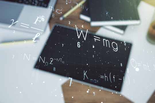 Creative scientific formula illustration and modern digital tablet on desktop on background, top view, science and research concept. Multiexposure - Powered by Adobe