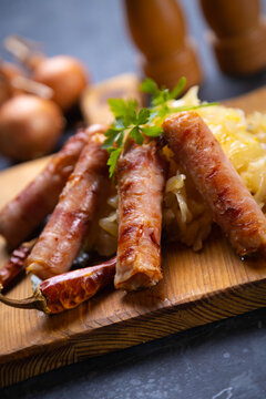 Grilled german sausage links with sauerkraut