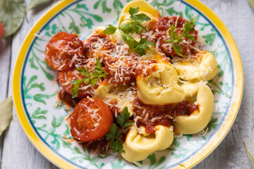 Italian tortellini pasta in tomato sauce