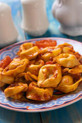 Italian tortellini pasta in tomato sauce