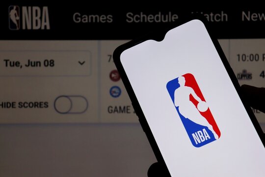 NBA logo displayed on smartphone screen, representing basketball and sports entertainment.