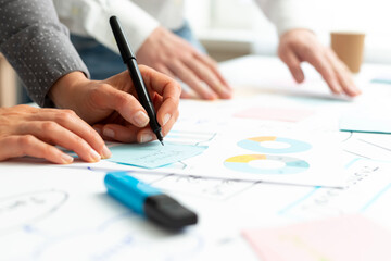 Business people hands do chart analysis and statistics. Marketing metrics planning. Colleagues...