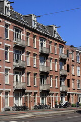 Fototapeta na wymiar Amsterdam Admiraal de Ruijterweg Street View with Buildings and Bicycles, Bos en Lommer District