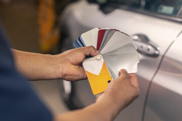 Auto Body selecting paint color for a vehicle