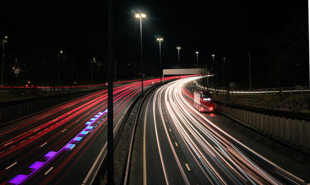 Glasgow Scotland June 2021 Traffic Trails On Busy Motorway At Night