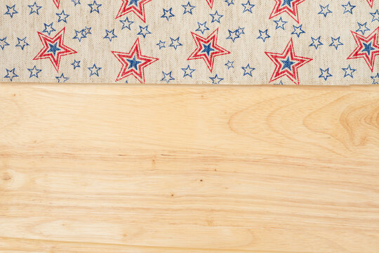 Retro American patriotic background with USA flag stars ribbon on wood