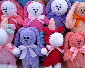 Knitted children's toys: hares, teddy, unicorns, deer