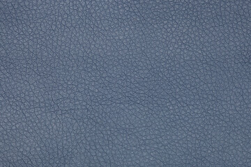 The background image is gray leather with an abstract texture