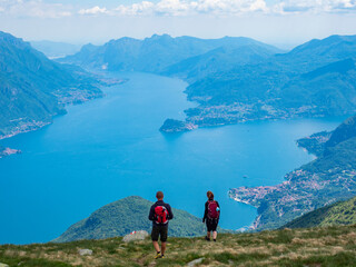 Trekking scene on Lake Como alps