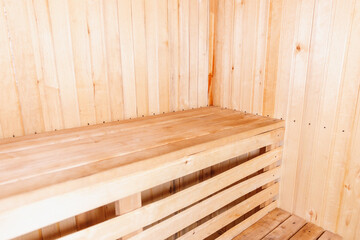 Fototapeta na wymiar Interior details of traditional Finnish sauna steam room. Traditional old Russian bathhouse SPA Concept. Relax country village bath concept.