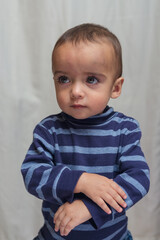 Fototapeta premium portrait of boy asking for forgiveness