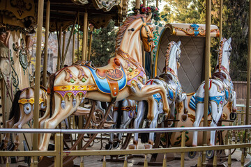 Fototapeta na wymiar carousel with horses, game for children