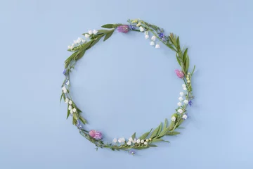 Fototapete Rund Floral round frame with copy space on a blue background. Summer or spring nature minimalistic background © Alina