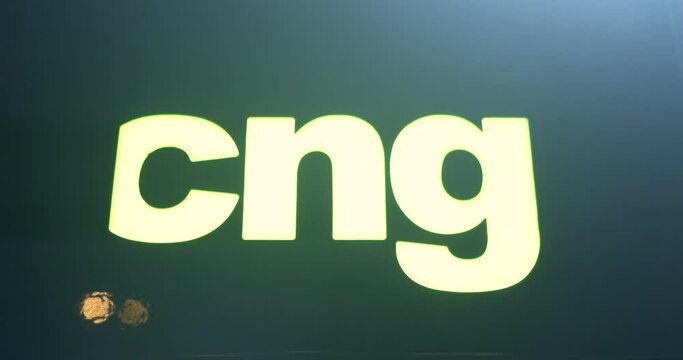 CNG symbol at a gas station. Attracting the attention of the buyer. gas designation. Dark background.
