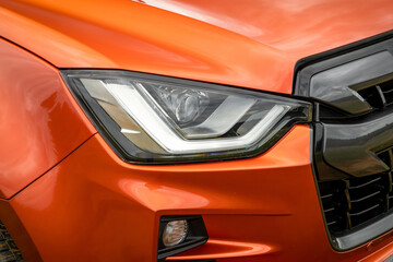 Close up of a new car's headlight