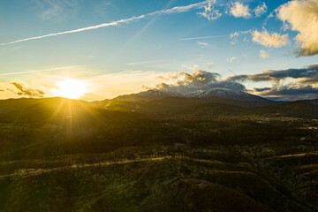 Winter Sunset Over Snowy Mountains In Northern California