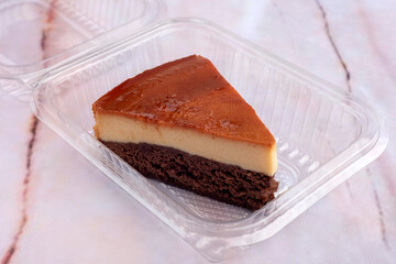 inverted cake chocoflan flan with chocolate sponge cake with cream delicious sweet dessert on counter