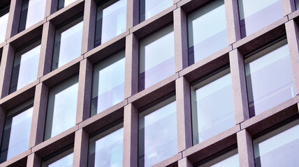 Abstract fragment of contemporary architecture, walls made of glass and concrete.