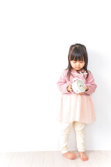 時計を持つ子供