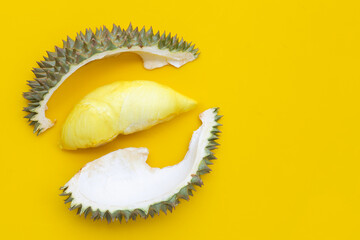 Fototapeta premium Durian on yellow background. Copy space