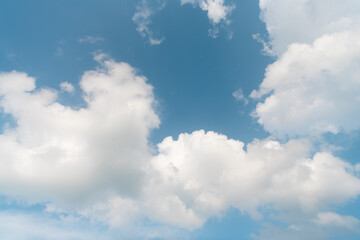 Naklejka na ściany i meble blue sunny sky with white clouds. sunny day. nature concept. Cloud sky background. Cloudy weather.