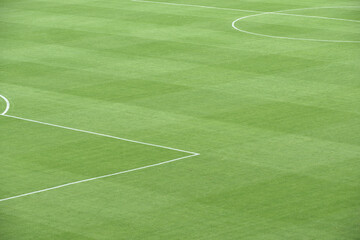 Green football field with nobody