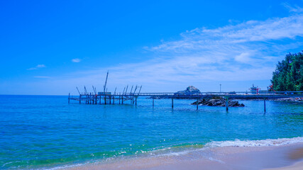 Fototapeta na wymiar Clear blue beach, sky and sandy beach