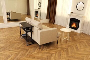 Modern living room with parquet flooring and fireplace