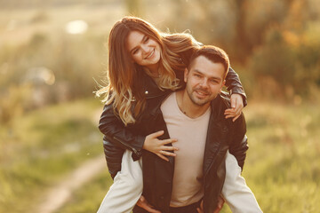 Fototapeta premium Beautiful couple spend time on a summer field