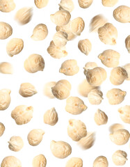 Many chickpeas falling on white background. Vegan diet