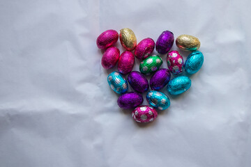 Close up of chocolate Easter eggs in the form of a heart.