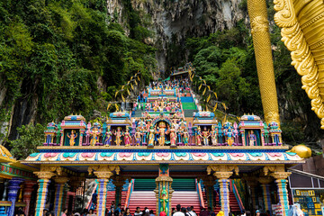 Fototapeta premium Hinduism Architecture and Statue of Batu caves - one of the most popular Hindu shrines outside India, and is dedicated to Lord Murugan in Kuala Lumpur, Malaysia