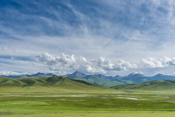Obraz premium Mountains and grasslands along G217 highway in Xinjiang, China in summer
