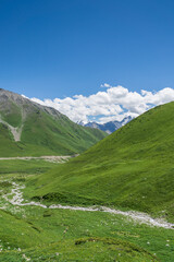 Obraz premium Mountains and grasslands along G217 highway in Xinjiang, China in summer