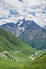 Mountains and grasslands along G217 highway in Xinjiang, China in summer