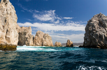 Fototapeta na wymiar Beautiful rocks and blue sea water near End of Land in Mexico