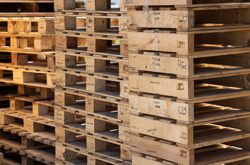 Stack of Old wooden pallets for reused to build a furniture , Recycle and reuse concept