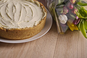 Banana homemade cream pie and a bouquet of flowers